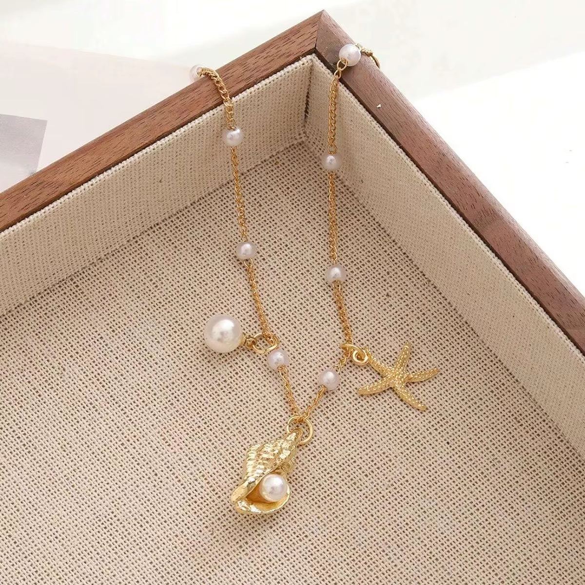 Chaine de cheville avec pendentifs marin