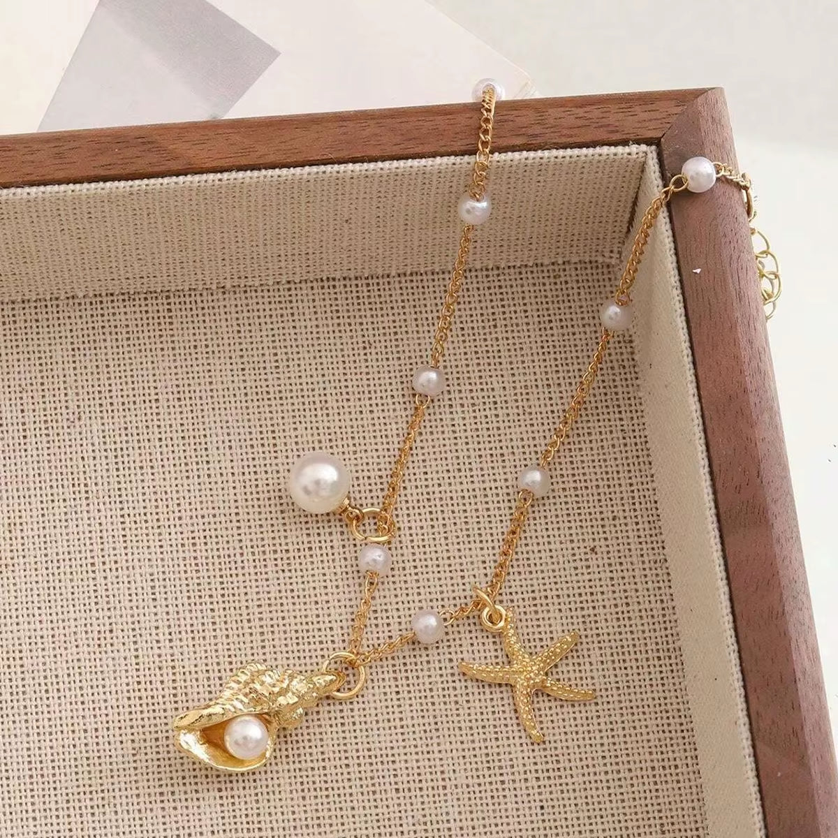 Chaine de cheville avec pendentifs marin