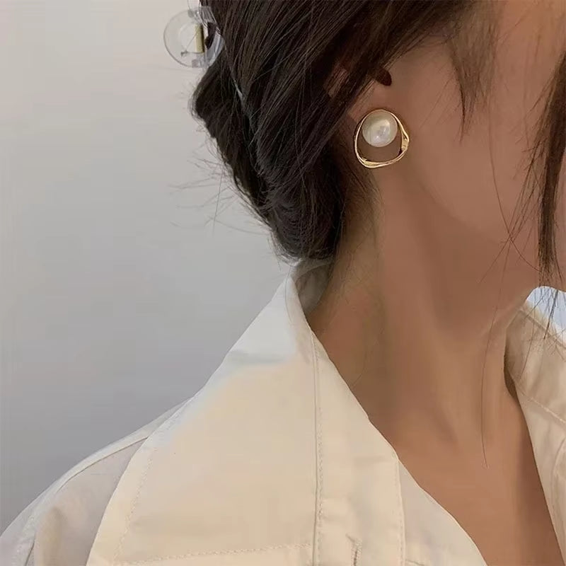 Perles d'oreilles avec cercles pendant