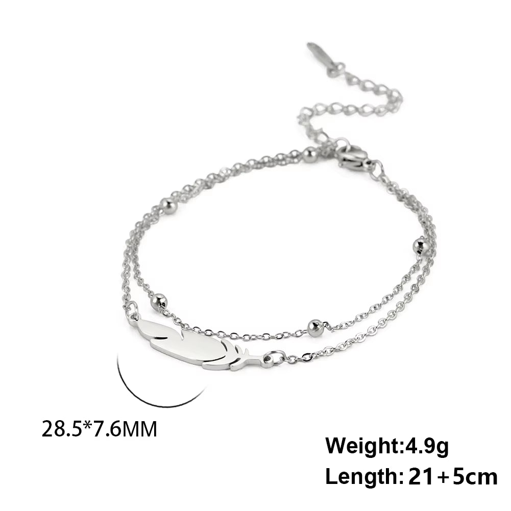 Chaines de cheville plume en acier inoxydable couleur or et argent