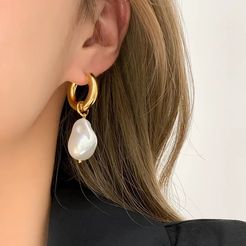 Boucles d'oreilles en cercles avec perles pendantes