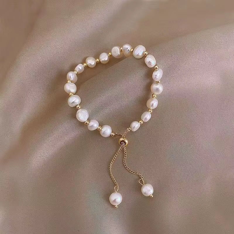 Bracelet en perle violettes réglable