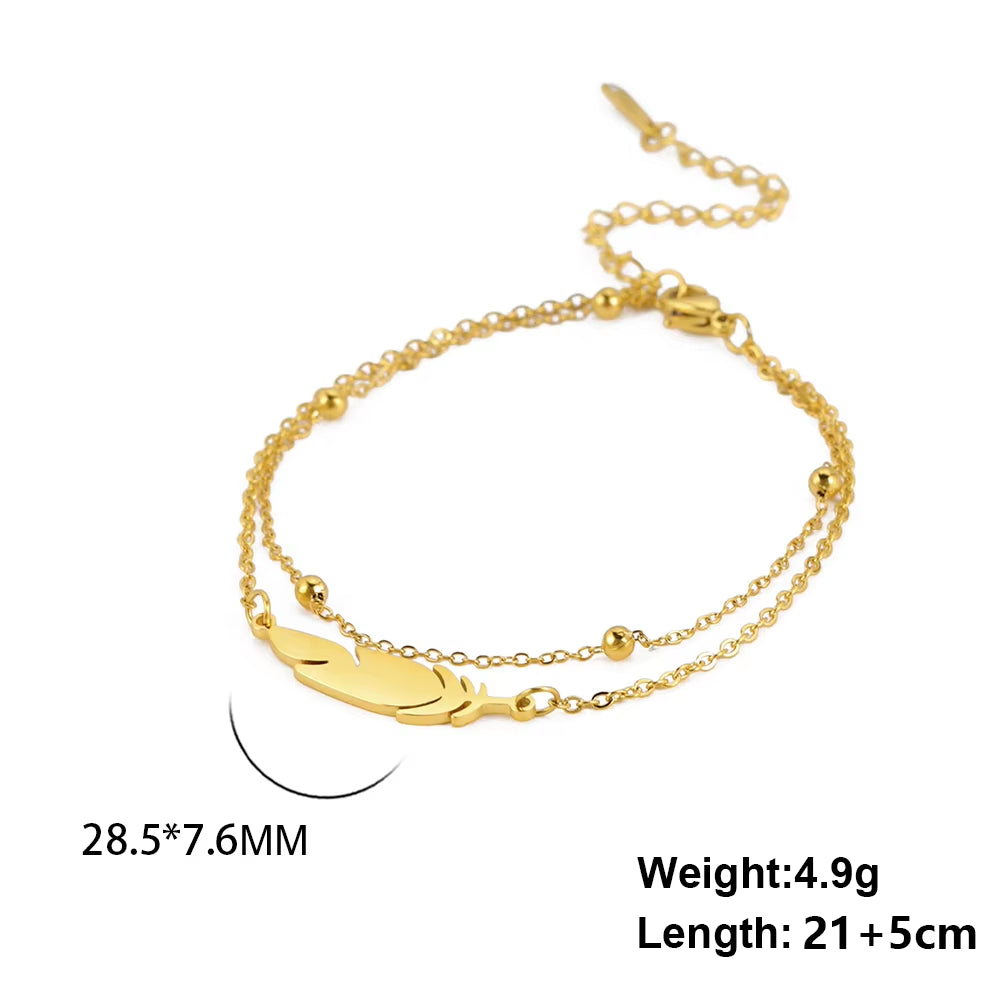 Chaines de cheville plume en acier inoxydable couleur or et argent