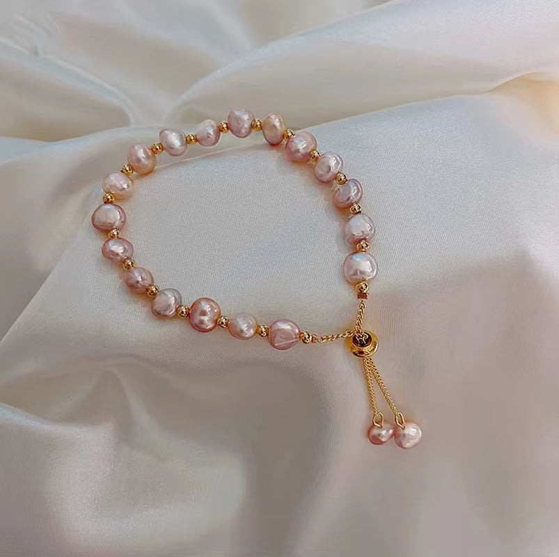 Bracelet en perle violettes réglable