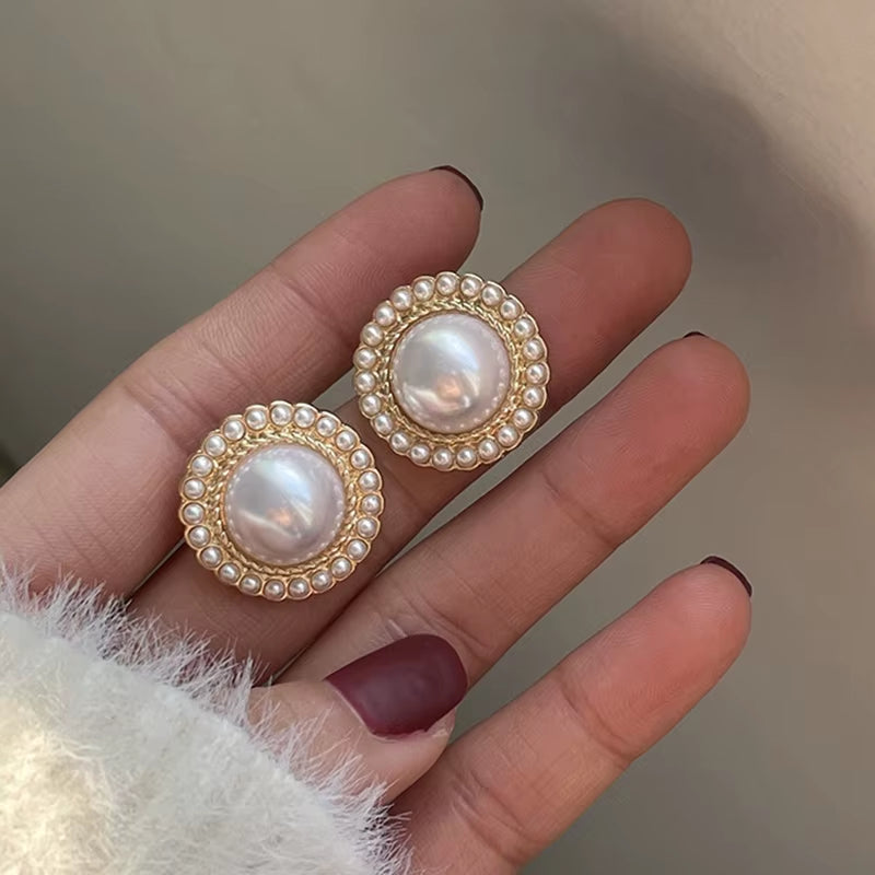 Boucles d'oreilles en cercles avec perles pendantes