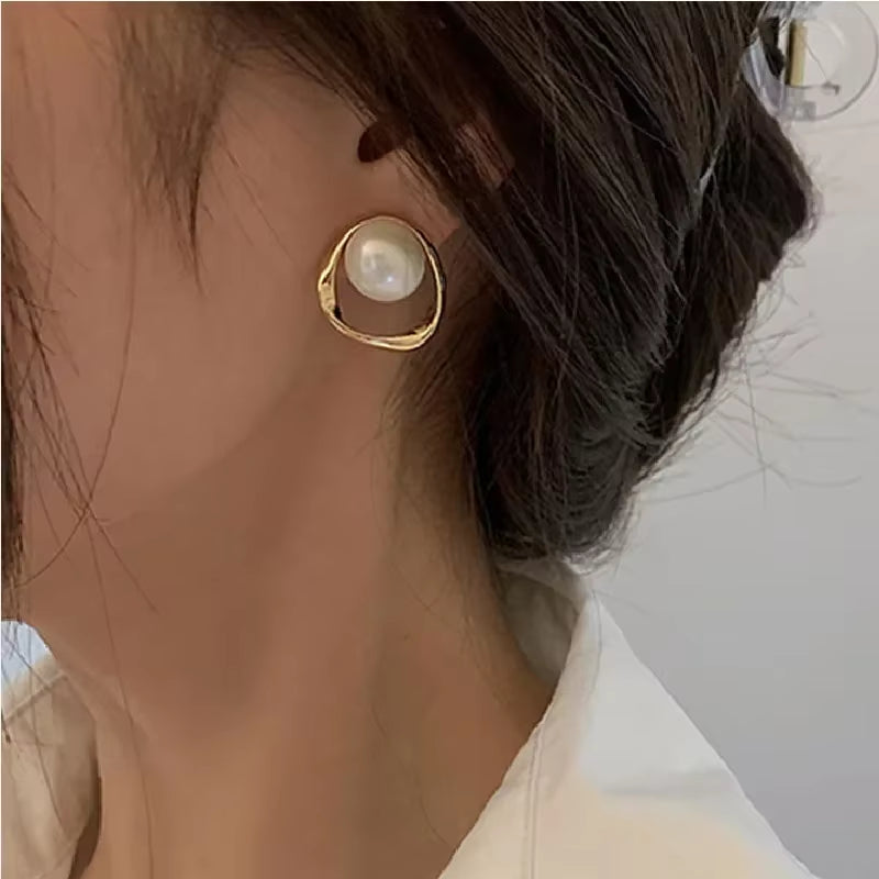 Perles d'oreilles avec cercles pendant