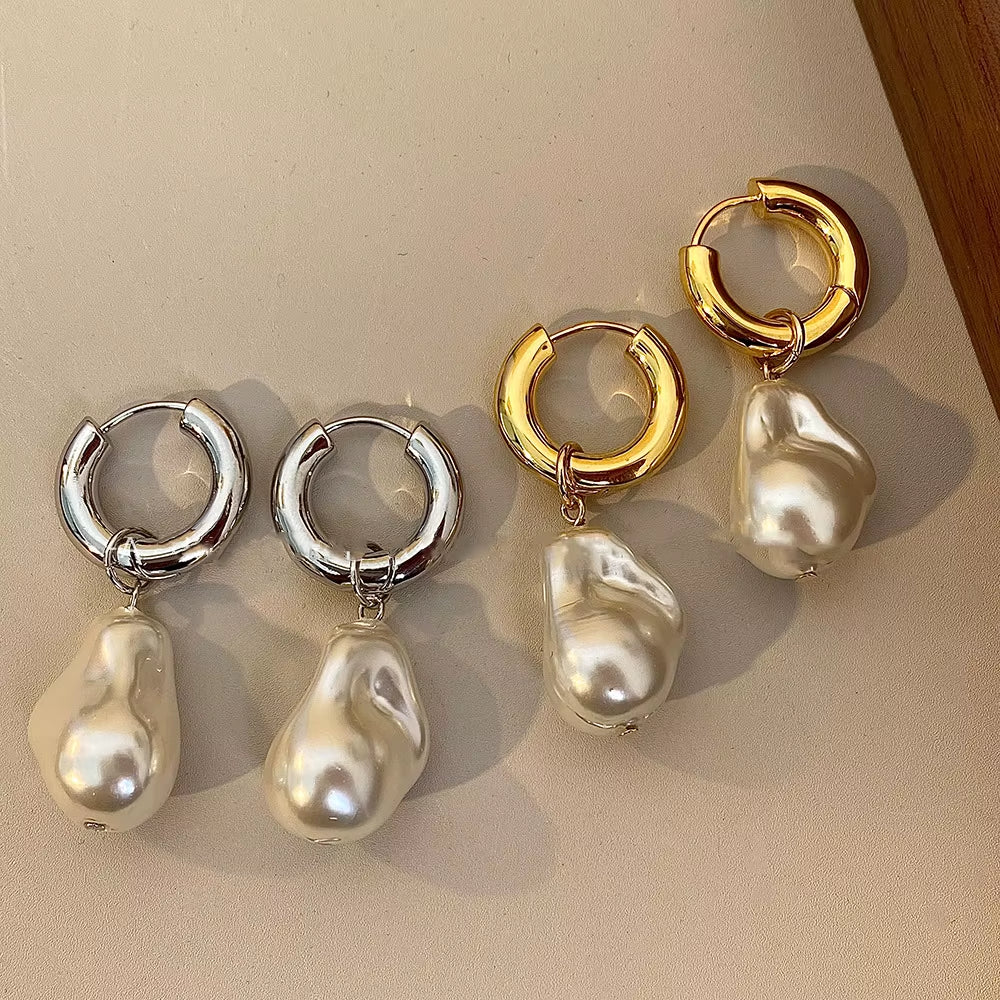 Boucles d'oreilles en cercles avec perles pendantes