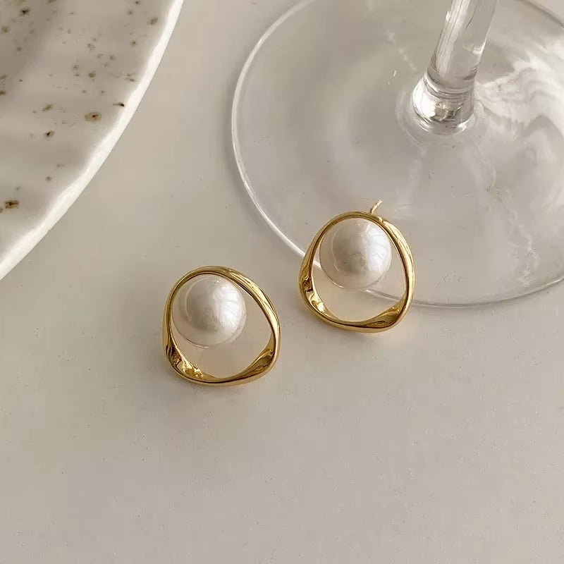 Perles d'oreilles avec cercles pendant