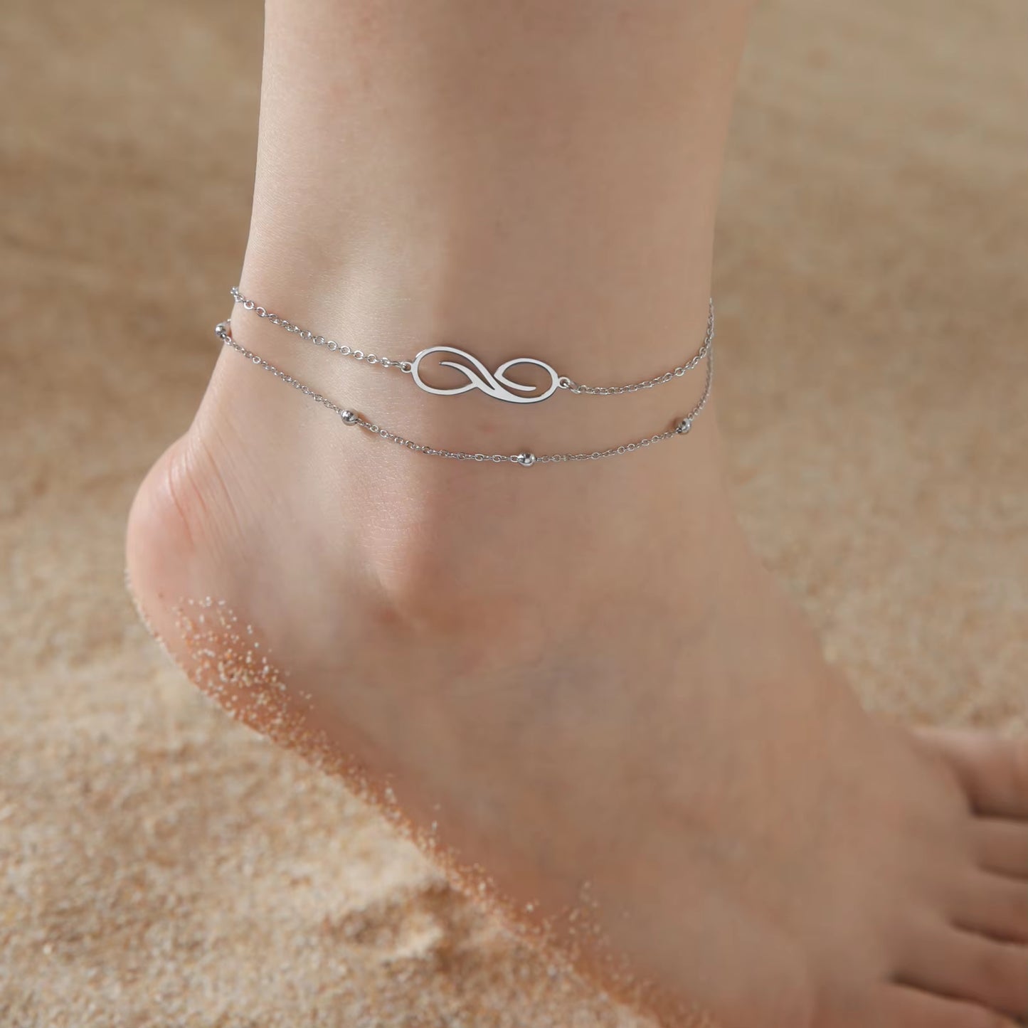 Chaines de cheville plume en acier inoxydable couleur or et argent