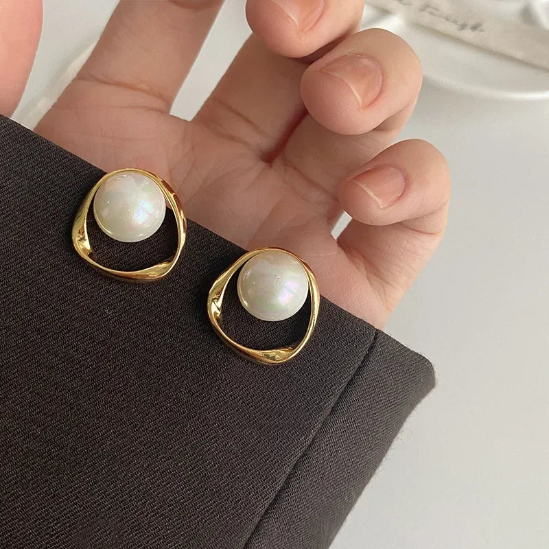 Perles d'oreilles avec cercles pendant