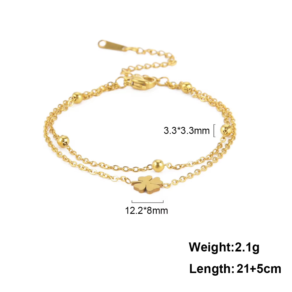 Chaines de cheville plume en acier inoxydable couleur or et argent