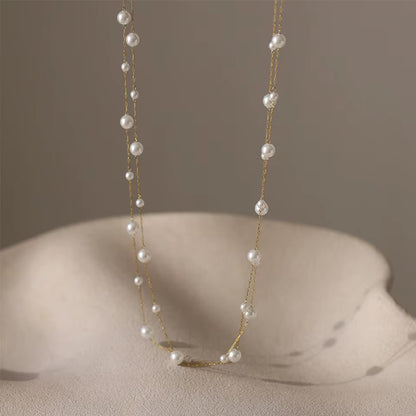 Chaine à perles ras de cou 