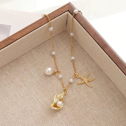 Chaine de cheville avec pendentifs marin