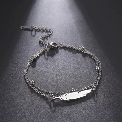 Chaines de cheville plume en acier inoxydable couleur or et argent