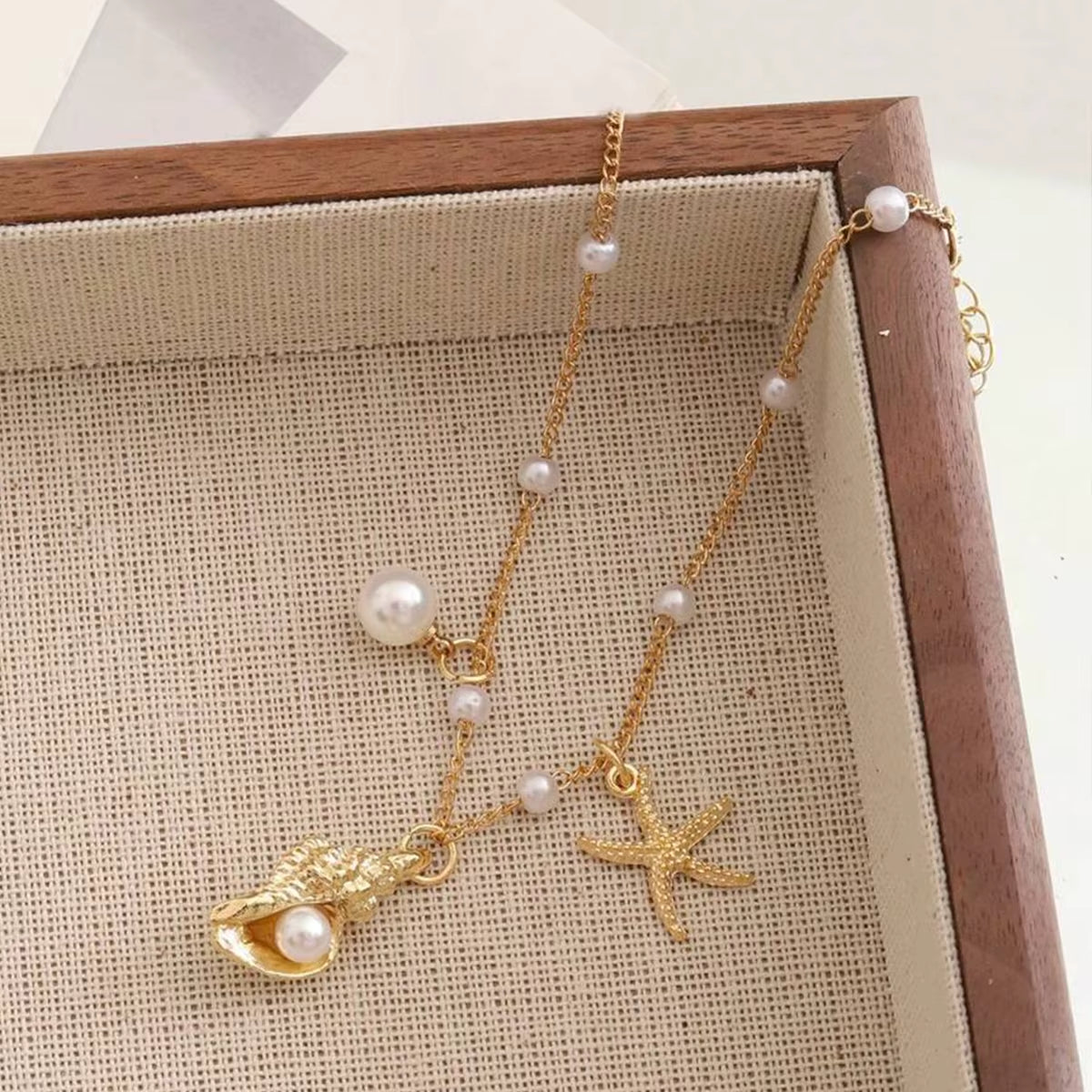 Chaine de cheville avec pendentifs marin