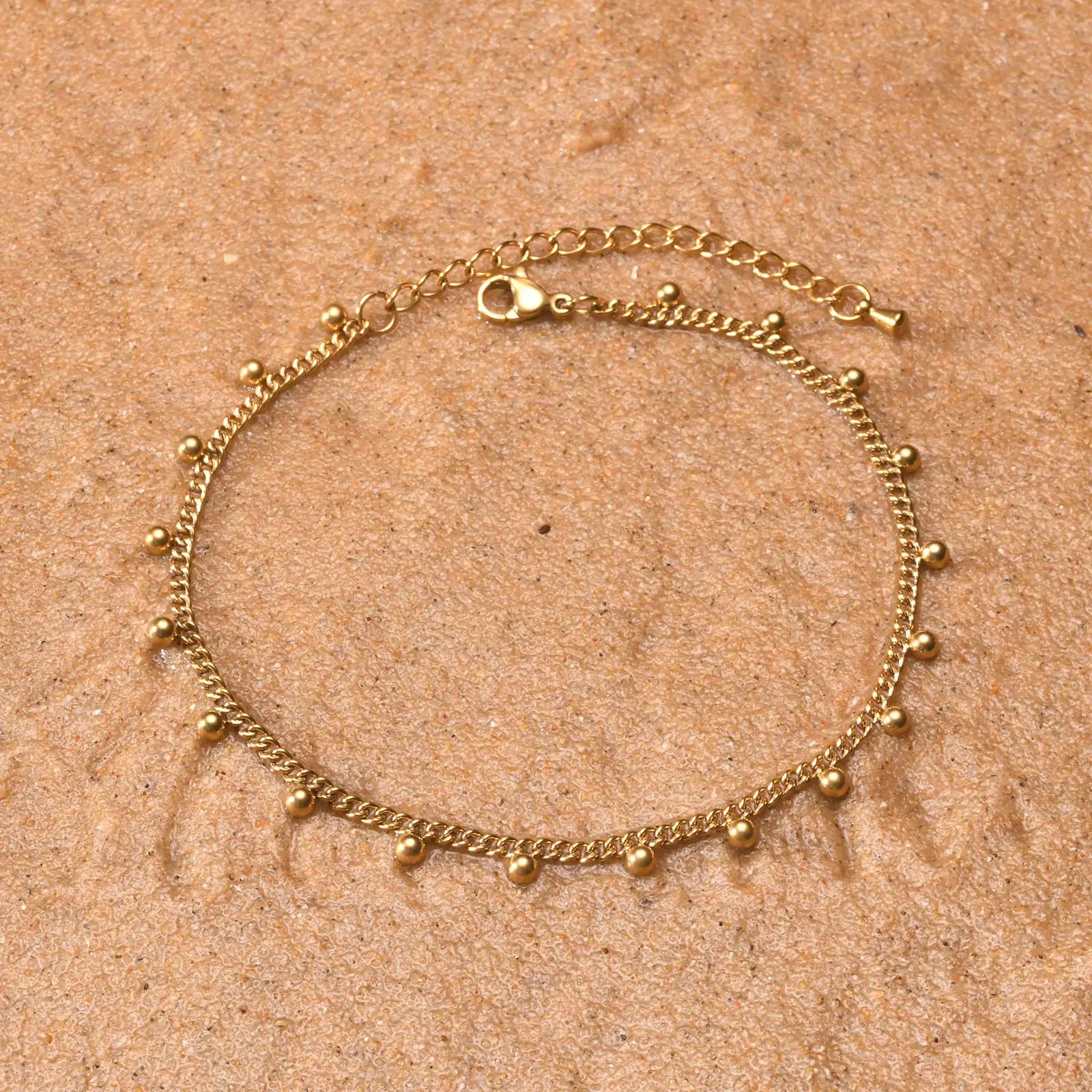Chaine de cheville à perles dorés 