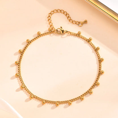 Chaine de cheville à perles dorés 