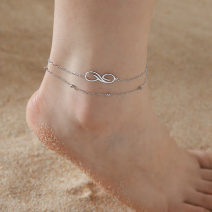 Chaines de cheville plume en acier inoxydable couleur or et argent